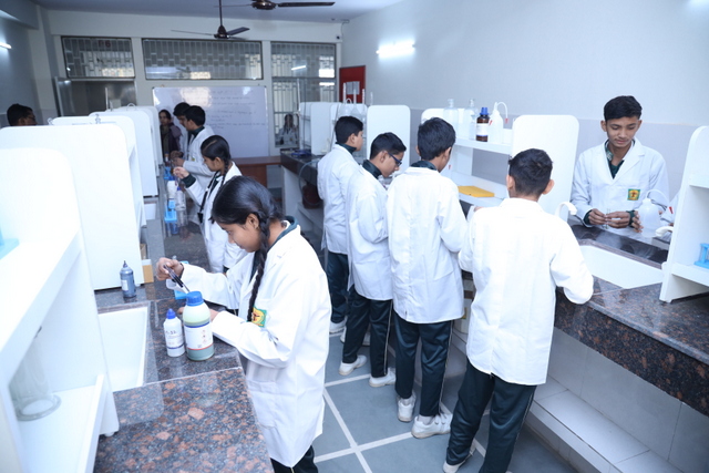 Students working in science laboratory